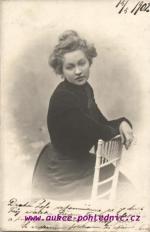 Žena